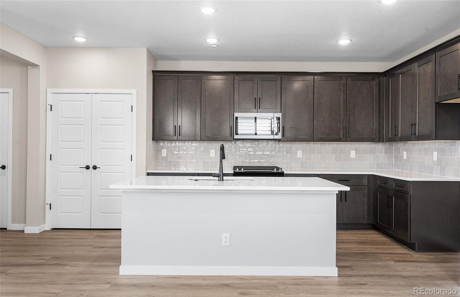 Furnished interior view inside a new home in Painted Prairie, Aurora (Image 7).