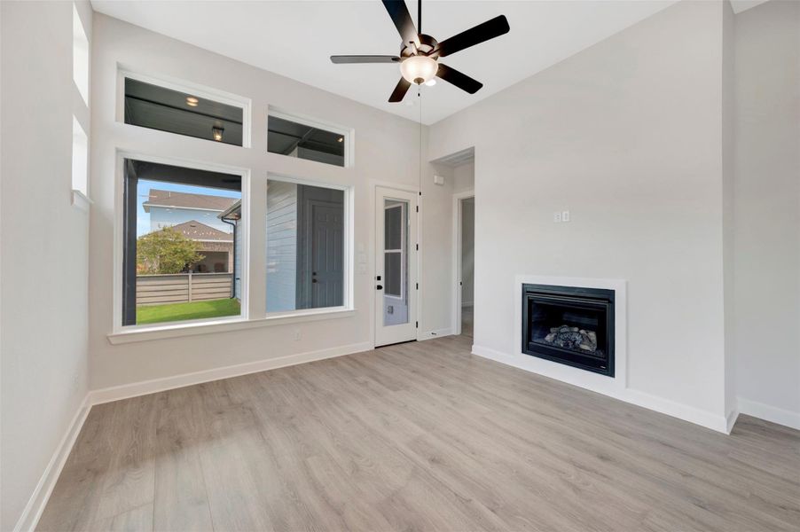 Spacious, unfurnished interior of a new home in Pomona - Grove Row Collection, Manvel (Image 12).