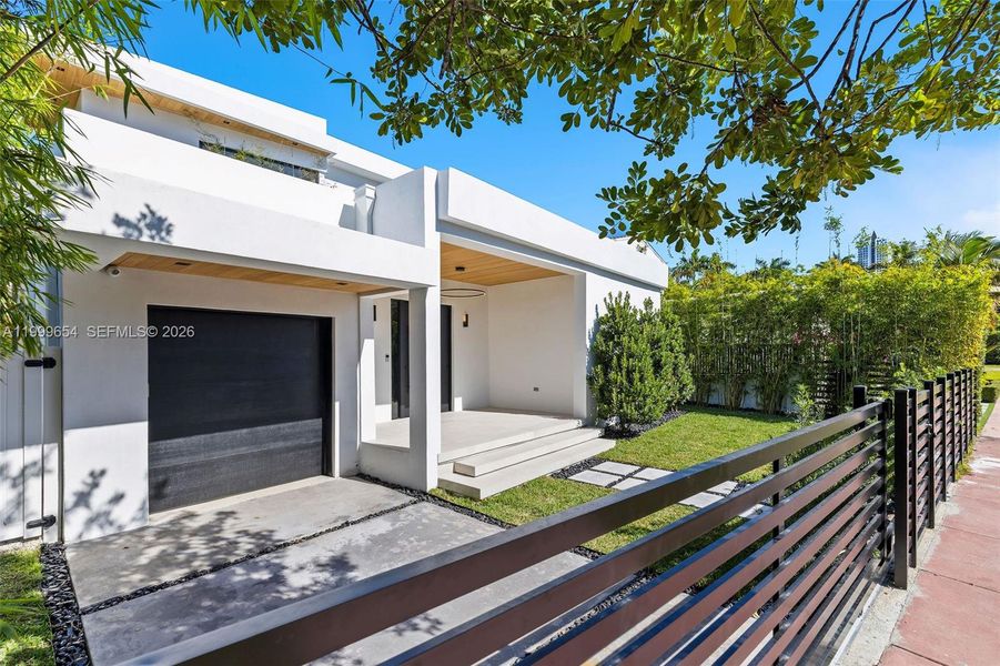 Exterior details and patio area of a home in , Miami Beach (Image 21). Exterior details and patio area of a home in , Miami Beach (Image 21).