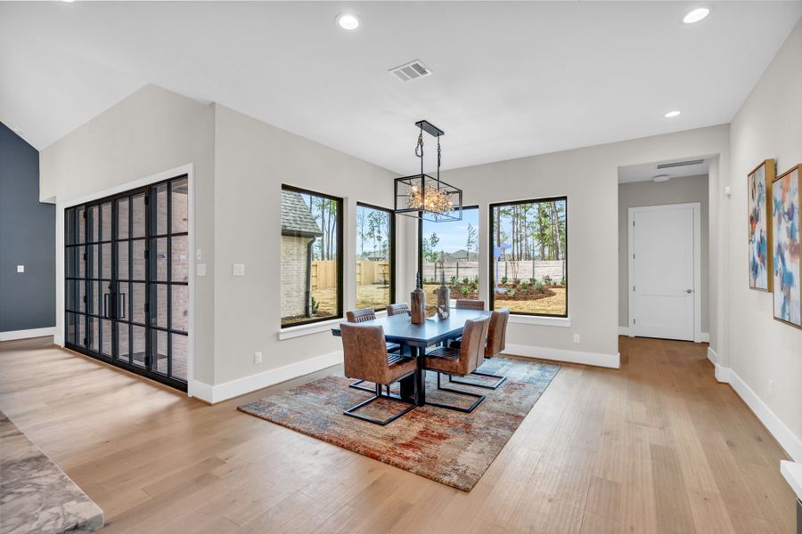 Furnished interior view inside a new home in ARTAVIA, Conroe (Image 9).