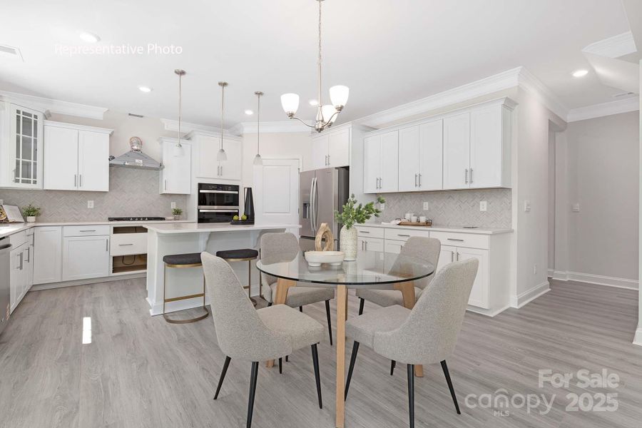 Furnished interior view inside a new home in Sanctuary at Southgate, Indian Trail (Image 6).
