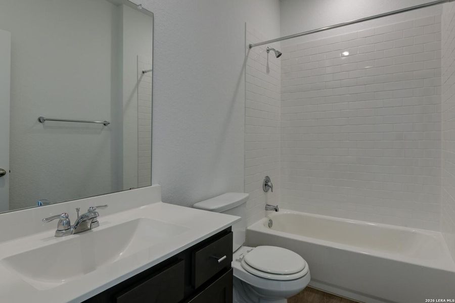 Furnished interior view inside a new home in Hennersby Hollow, San Antonio (Image 7).