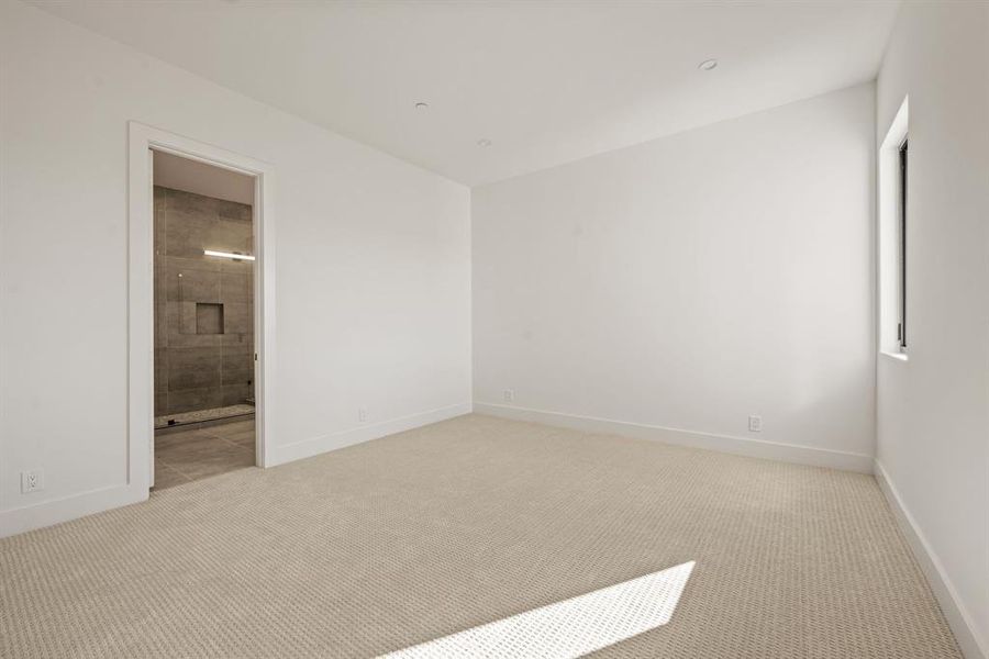Spacious secondary bedroom with natural light. Spacious secondary bedroom with natural light.