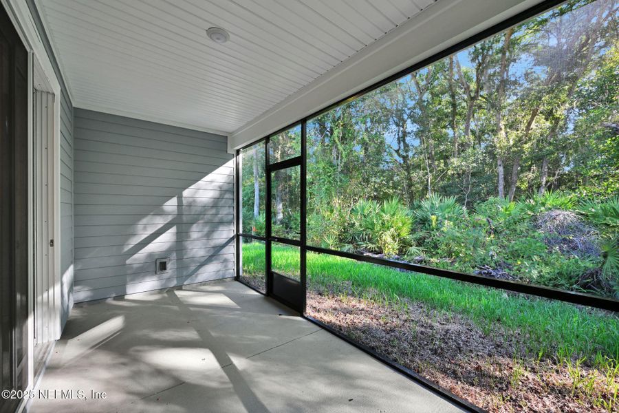 Exterior details and patio area of a home in Landing at Olde Florida, St. Augustine (Image 3).