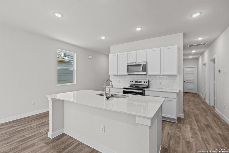 Furnished interior view inside a new home in Hacienda, San Antonio (Image 8).