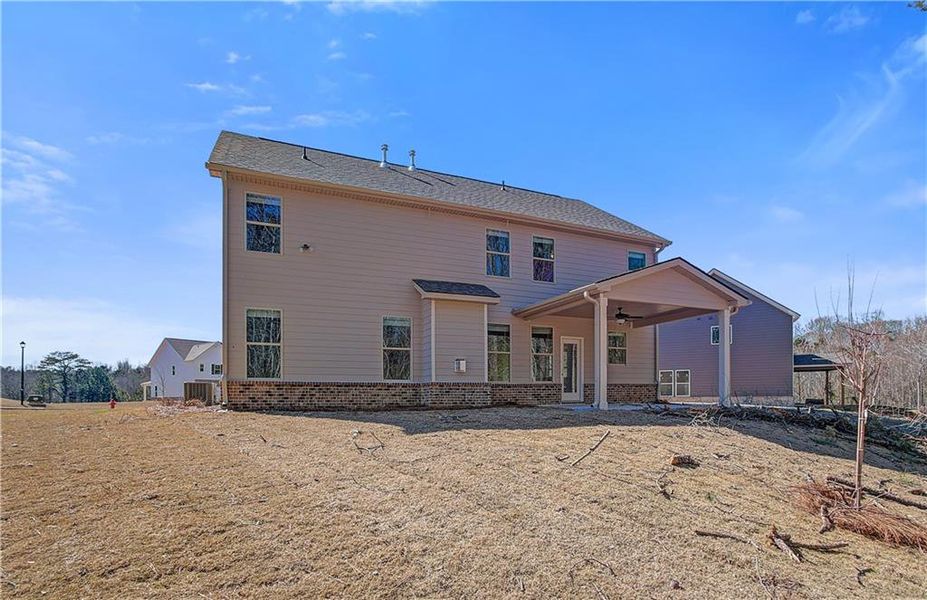 Exterior details and patio area of a home in Copperfield, Locust Grove (Image 3).