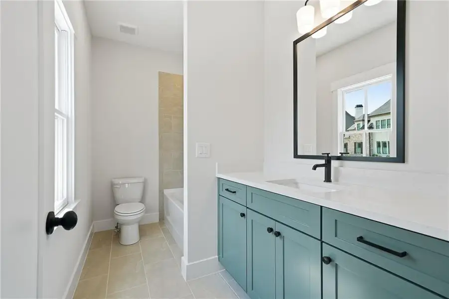 Furnished interior view inside a new home in Malone's Pond, Ball Ground (Image 10).