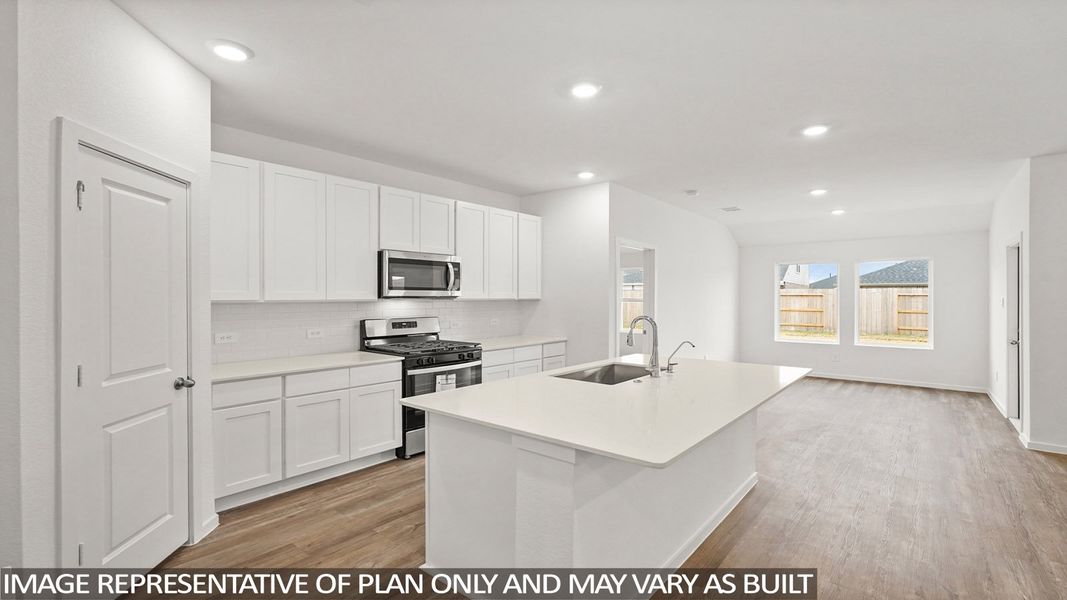 Furnished interior view inside a new home in Sunterra, Katy (Image 7).
