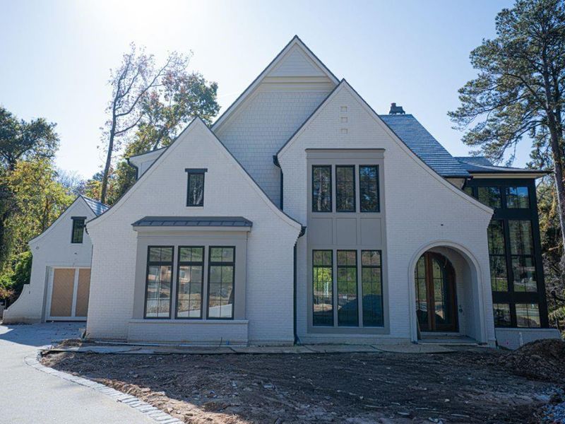 Front exterior of a new home in Blue Heron Walk, Atlanta, GA, highlighting curb appeal (Image 9).