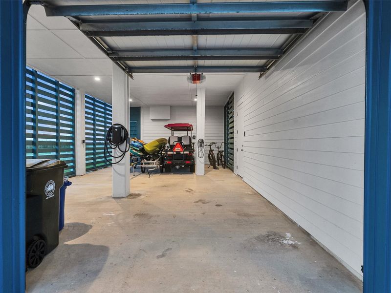 The garage is designed for convenience and functionality, featuring an EV charger, a dedicated space for your golf cart, and a discreet workshop—perfect for projects or storage—while keeping the space organized and uncluttered. The garage is designed for convenience and functionality, featuring an EV charger, a dedicated space for your golf cart, and a discreet workshop—perfect for projects or storage—while keeping the space organized and uncluttered.