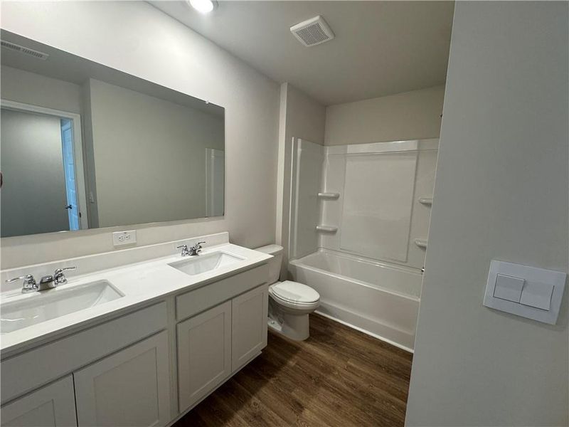 Furnished interior view inside a new home in Oakchase at Hampton, Hampton (Image 6). Furnished interior view inside a new home in Oakchase at Hampton, Hampton (Image 6).