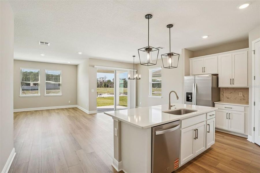Furnished interior view inside a new home in Legends Preserve - Signature Series, Daytona Beach (Image 5).