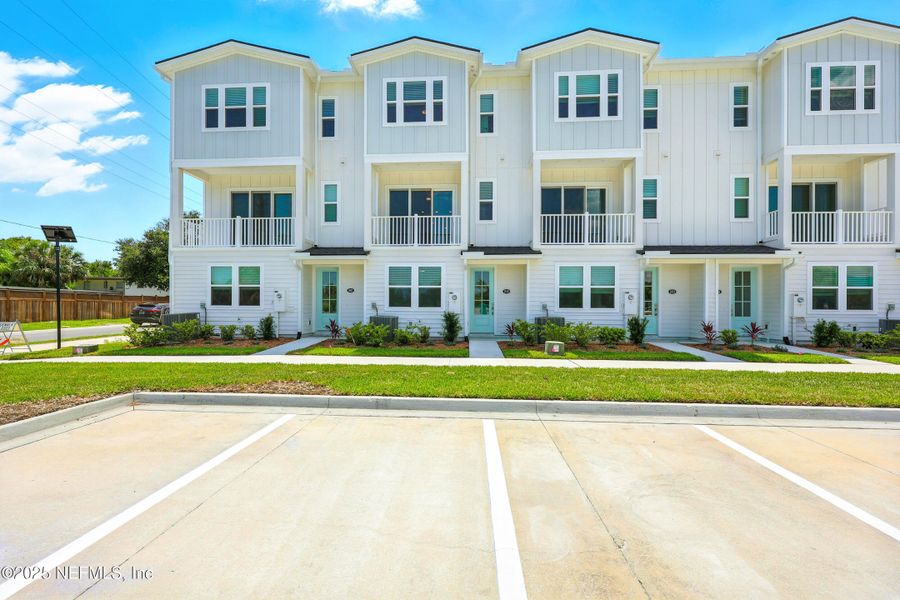 Front exterior of a new home in , Jacksonville Beach, FL, highlighting curb appeal (Image 2).