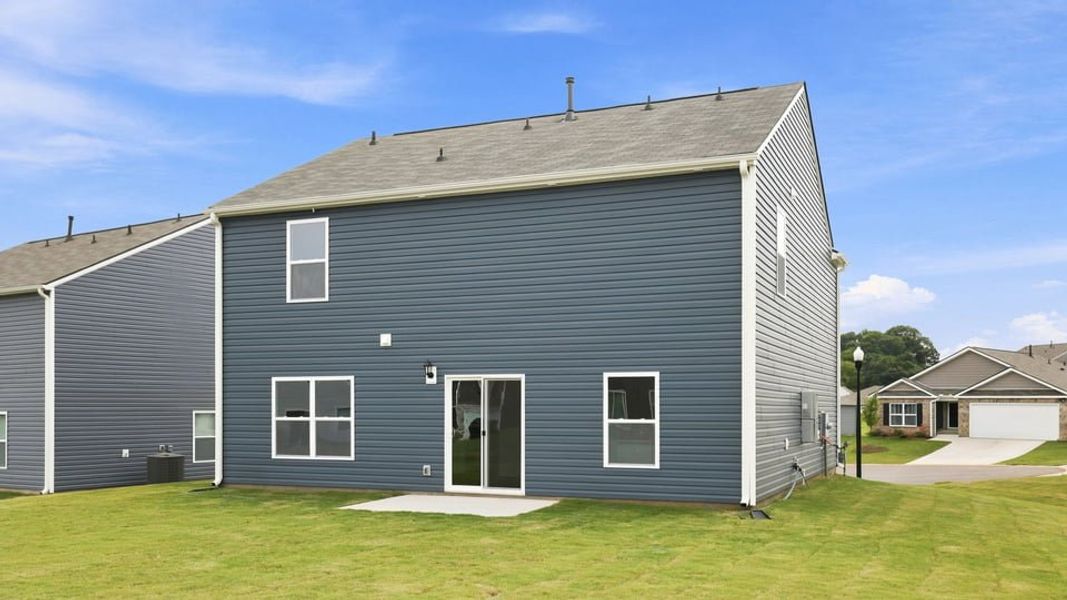 Exterior details and patio area of a home in Lakestone, Woodruff (Image 19).
