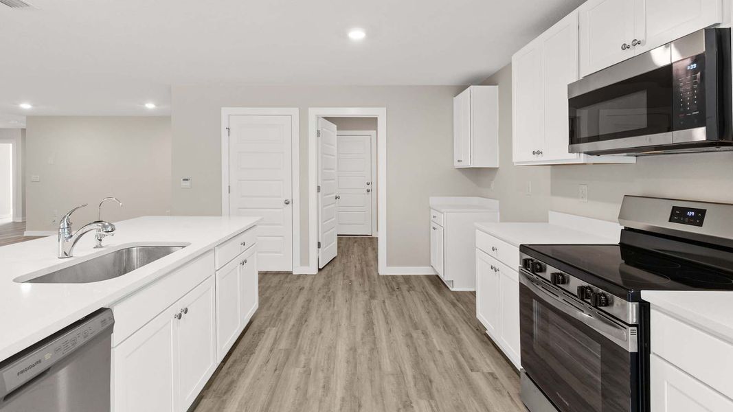 Furnished interior view inside a new home in Sunny Hills, Chipley (Image 5).