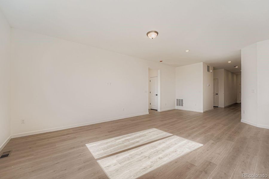 Images not from actual home, but are from same floor plan.