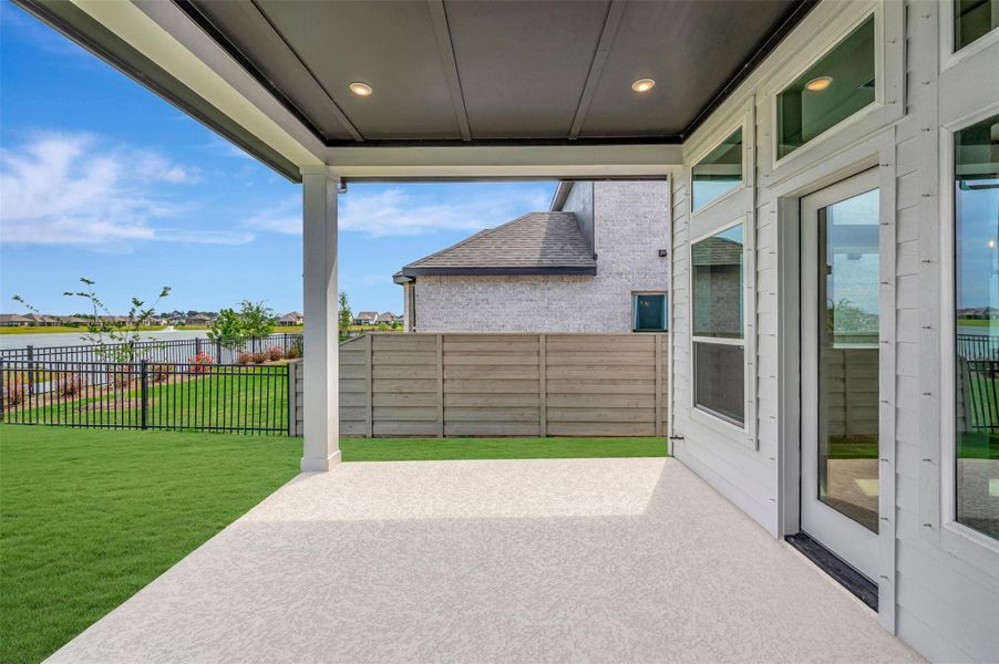 Exterior details and patio area of a home in Pomona - Reserve Collection, Manvel (Image 27).