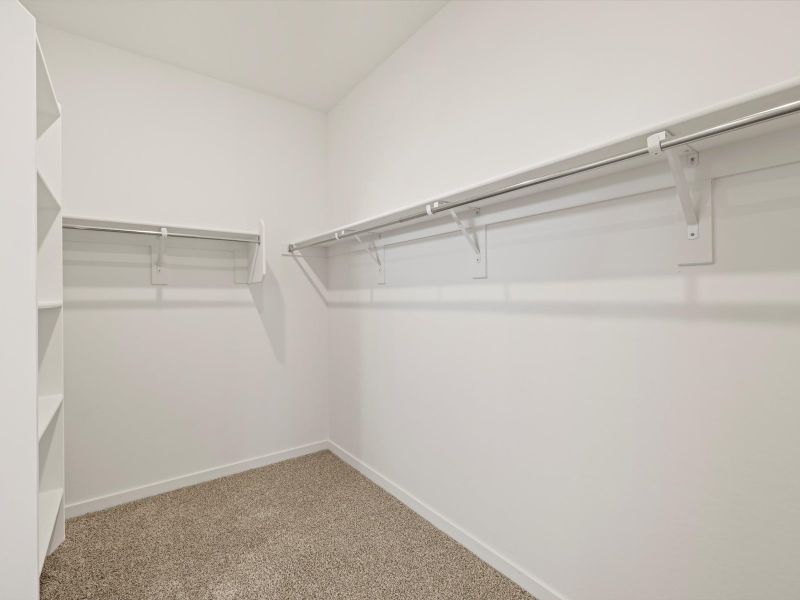 Spacious, unfurnished interior of a new home in Rancho Mirage Estate Series, Maricopa (Image 12).