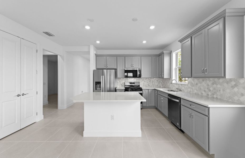 Furnished interior view inside a new home in TerraWalk at Babcock Ranch, Alva (Image 9).