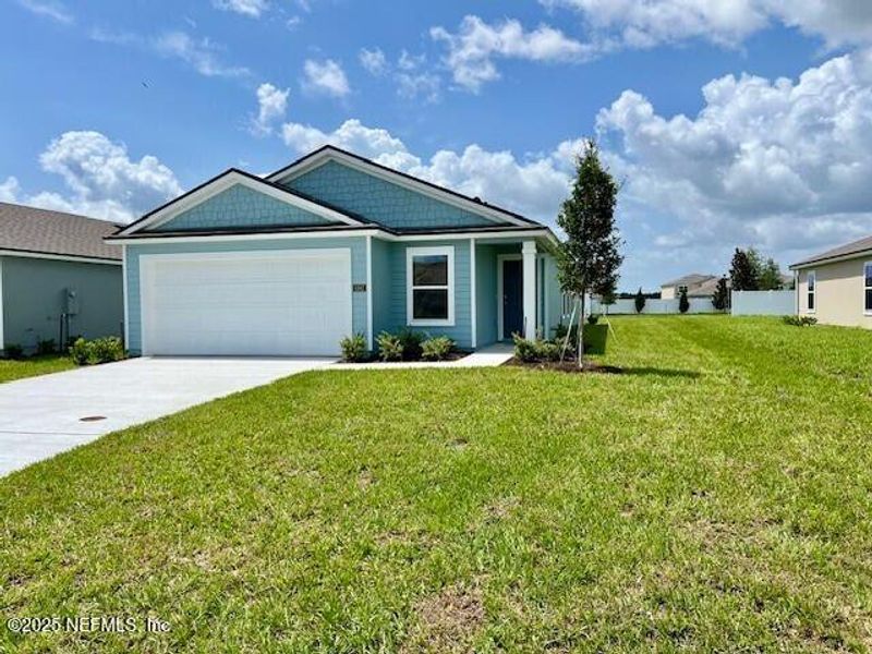 Front exterior of a new home in Rookery, Green Cove Springs, FL, highlighting curb appeal (Image 8).