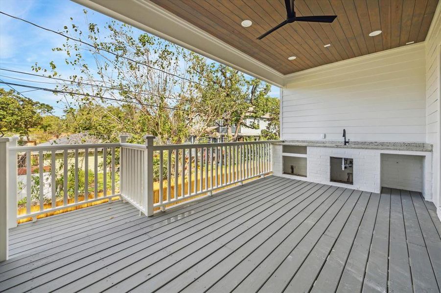 Outdoor kitchen and entertaining area off of Family Room, Kitchen and Dining Room. Photo as of 11/5/2024