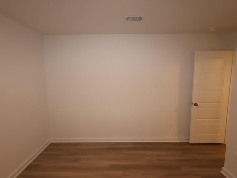 Spacious, unfurnished interior of a new home in Pinewood at Grand Texas, New Caney (Image 8).