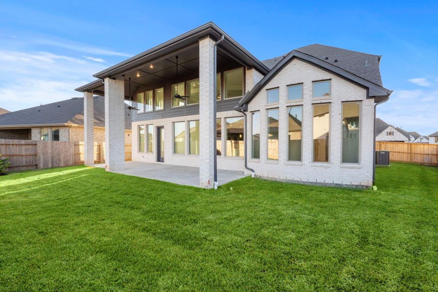 Exterior details and patio area of a home in Coastal Point, League City (Image 20).