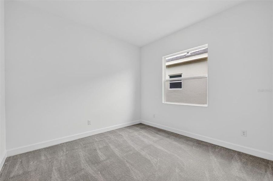 Spacious, unfurnished interior of a new home in Winding Ridge, Wesley Chapel (Image 34).