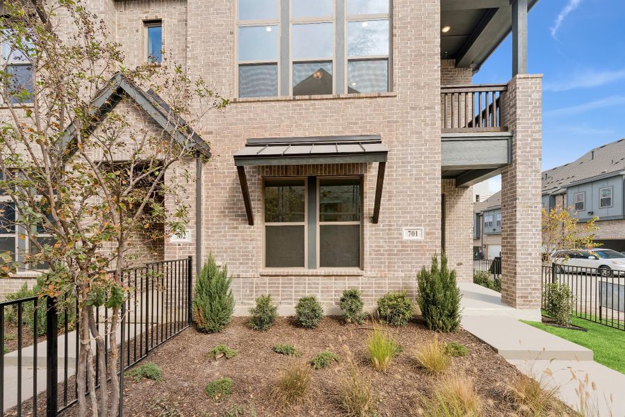 Exterior details and patio area of a home in Hillside at Las Colinas, Irving (Image 4). Exterior details and patio area of a home in Hillside at Las Colinas, Irving (Image 4).
