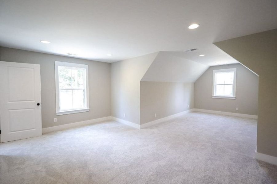Spacious, unfurnished interior of a new home in Baker Road, Birchwood (Image 76).