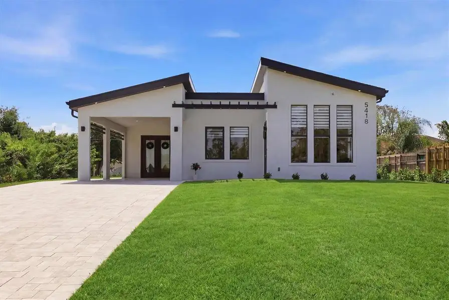 Front exterior of a new home in , Port Charlotte, FL, highlighting curb appeal (Image 2). Front exterior of a new home in , Port Charlotte, FL, highlighting curb appeal (Image 2).