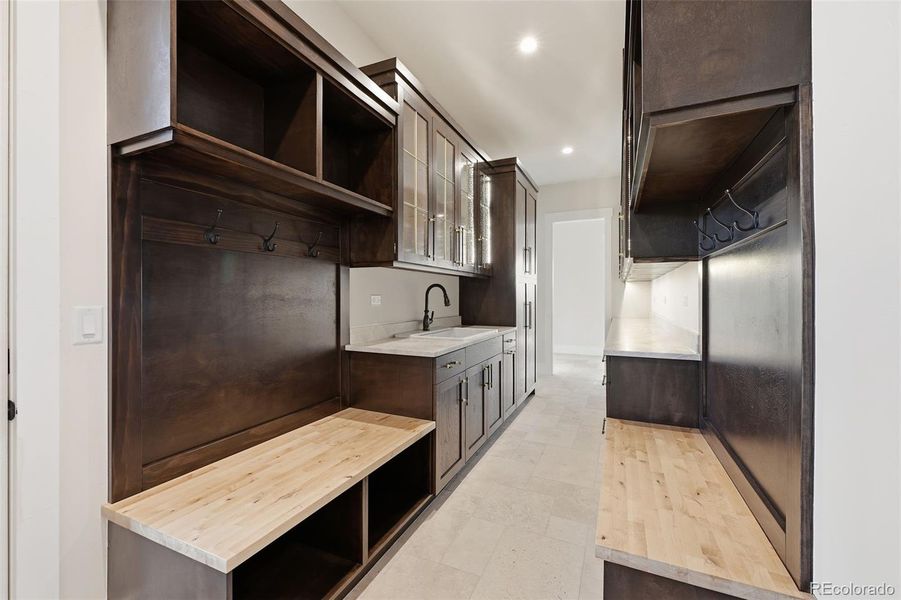 Galley area viewed from left entrance to main level and garage entrance. Galley area viewed from left entrance to main level and garage entrance.