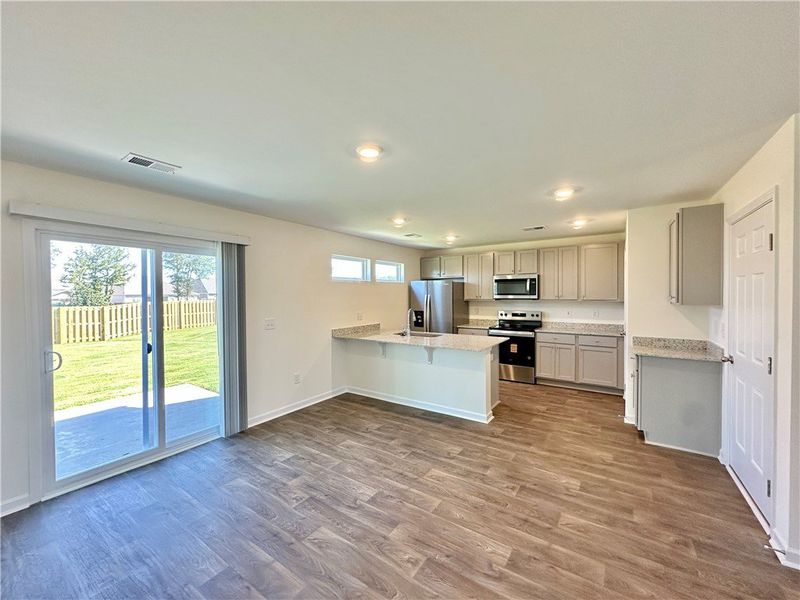 Spacious, unfurnished interior of a new home in Champions Village at Cherry Hill, Pendleton (Image 7).