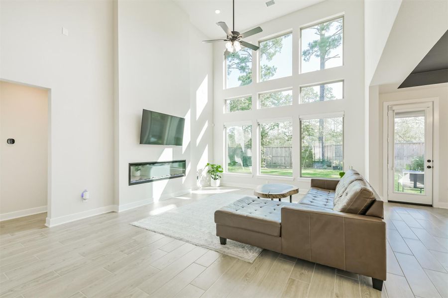 Furnished interior view inside a new home in The Woodlands Hills – 55', Willis (Image 9).