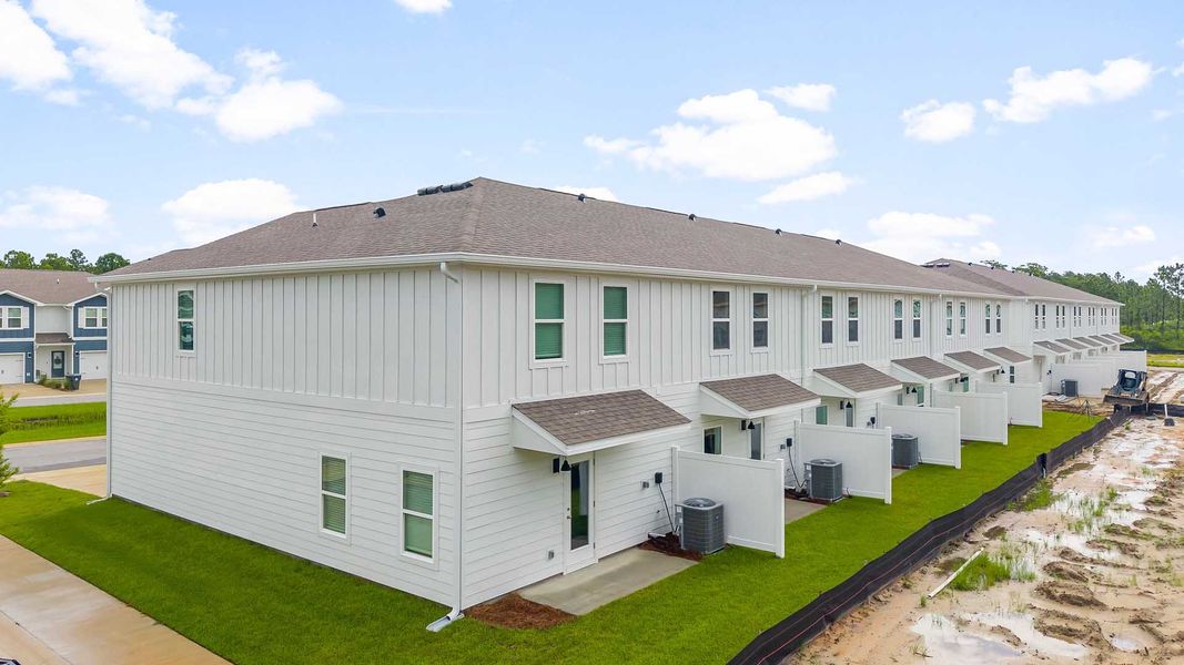 Exterior details and patio area of a home in Hawks Landing Townhomes, Santa Rosa Beach (Image 3).