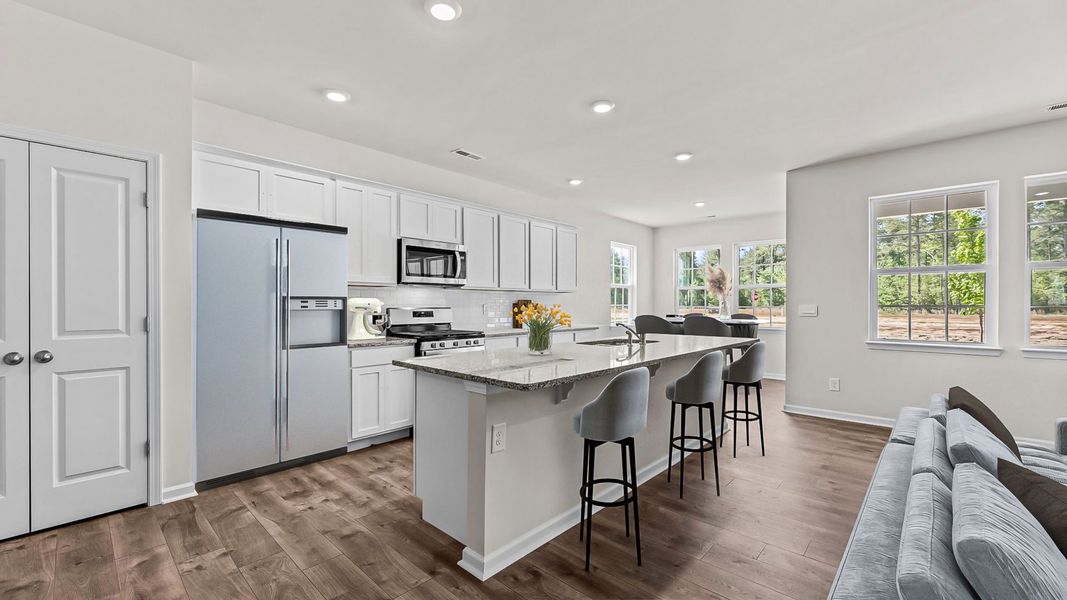 Representative furnished interior of a home built from the ABERDEEN by D.R. Horton in East Ridge, Ayden (Image 7).