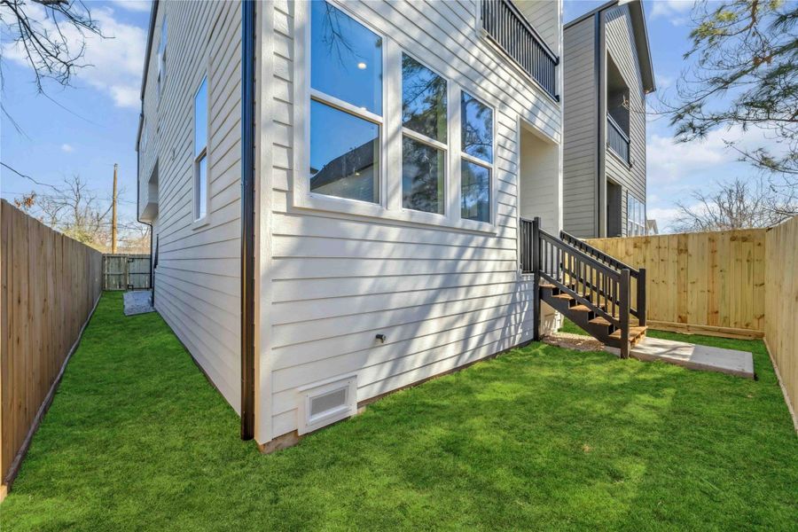 Exterior details and patio area of a home in , Houston (Image 25).