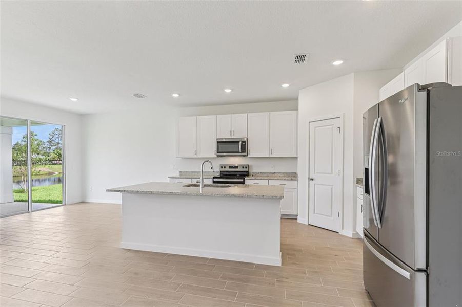 Furnished interior view inside a new home in Colbert Landings, Palm Coast (Image 4).