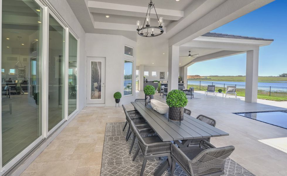 Exterior details and patio area of a home in West Hill Estates, Dade City (Image 28).