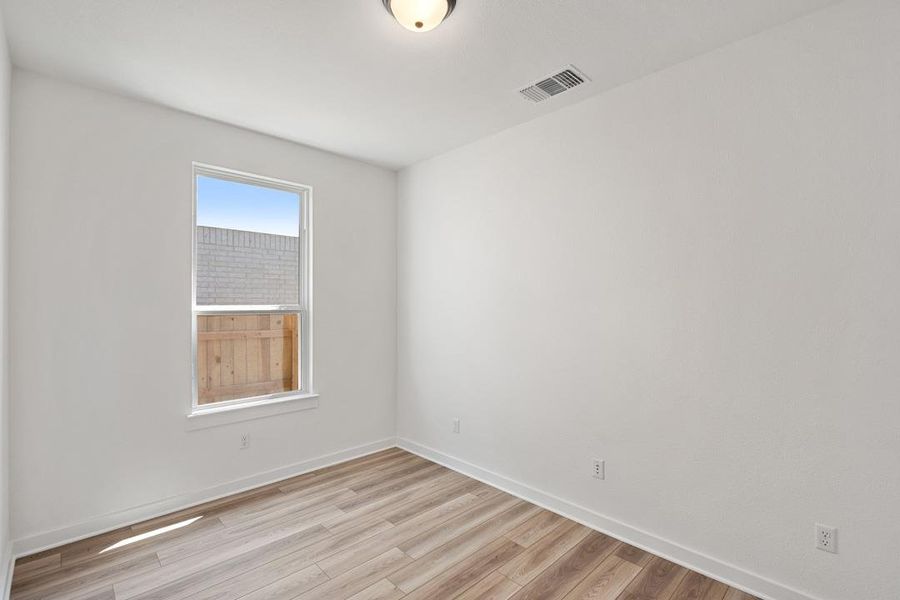 Spacious, unfurnished interior of a new home in Flora, Hutto (Image 31).