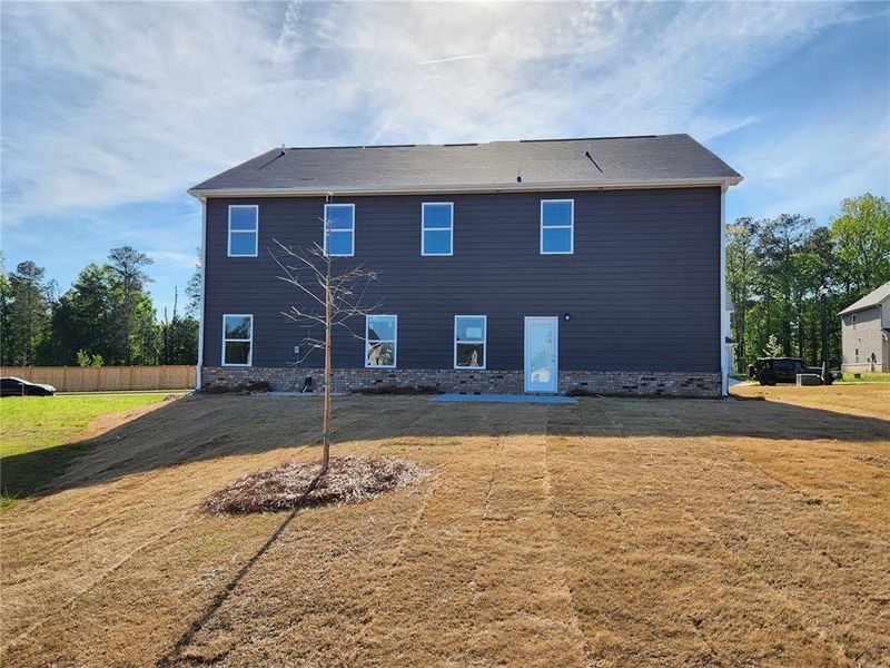 Exterior details and patio area of a home in Southern Hills, McDonough (Image 3).