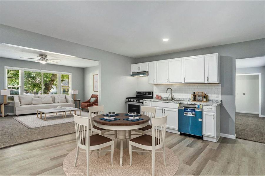 *Virtually Staged* Kitchen and Dining Area open to the living space for seemless entertaining.