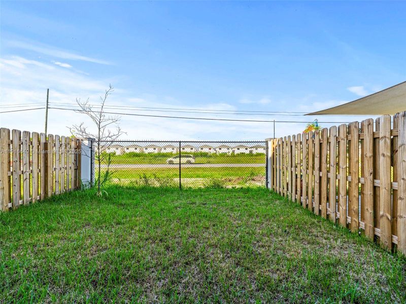 Exterior details and patio area of a home in , Homestead (Image 28). Exterior details and patio area of a home in , Homestead (Image 28).