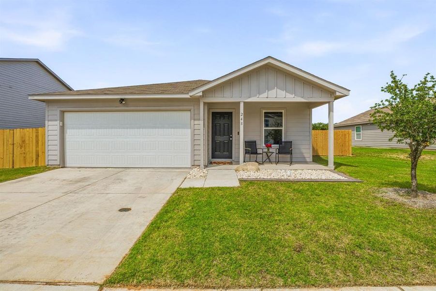 Front exterior of a new home in Tolar Oaks, Tolar, TX, highlighting curb appeal (Image 22).