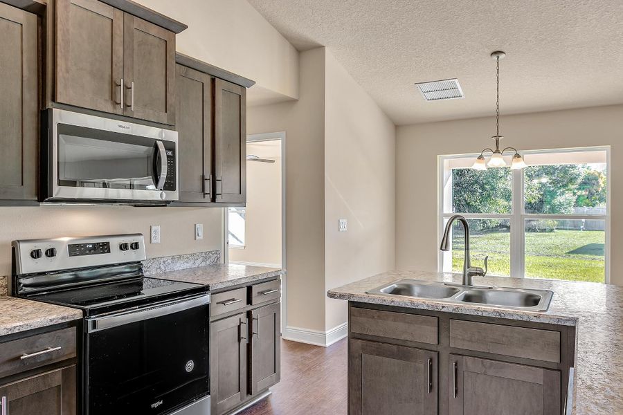 Furnished interior view inside a new home in Spring Hill, Spring Hill (Image 4).