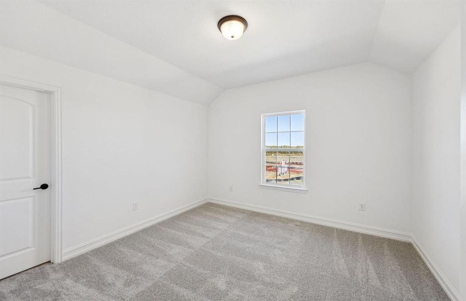 Comfortable bedroom with a bright window view Comfortable bedroom with a bright window view