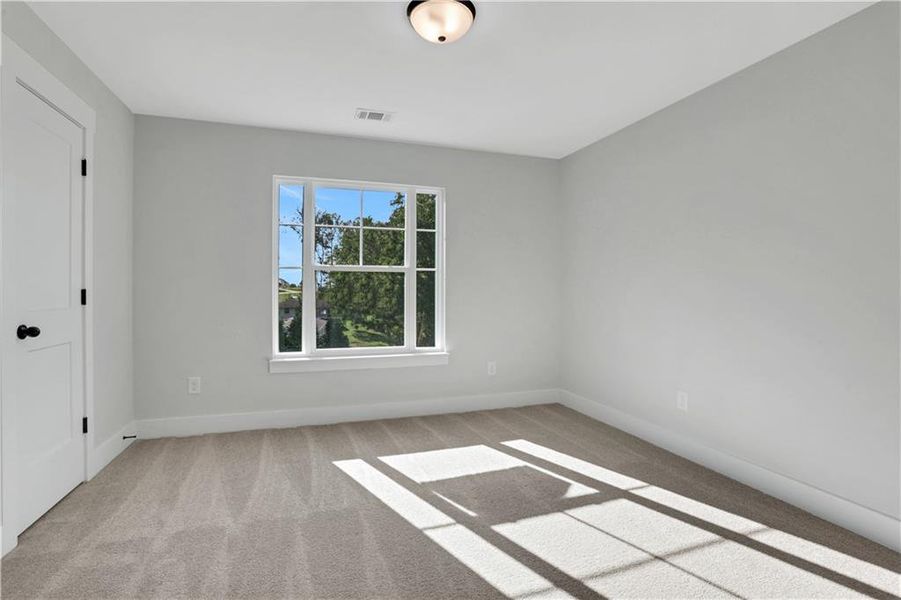 Spacious, unfurnished interior of a new home in Cambridge, Flowery Branch (Image 29).