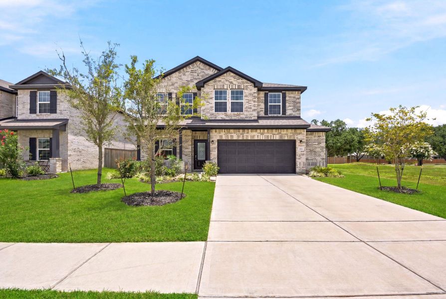 Front exterior of a new home in Massey Oaks, Pearland, TX, highlighting curb appeal (Image 26).