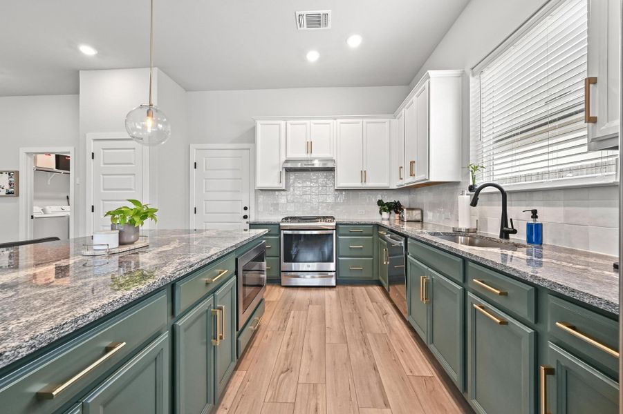 What a stylish and spacious kitchen! What a stylish and spacious kitchen!