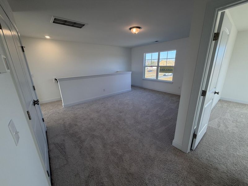 Spacious, unfurnished interior of a new home in Black Forest Pointe, Benson (Image 13).